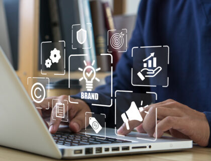 Man using laptop for brand marketing and management, branding concept.ideas,designed,logos, catchy slogans, unique products, or excellent services.Branding banner.